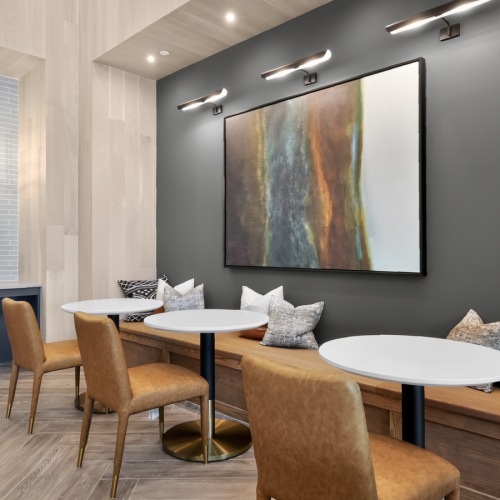 a work room with tables and chairs