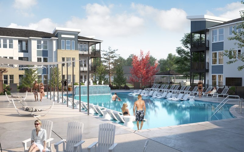 courtyard with a pool and lounge chairs